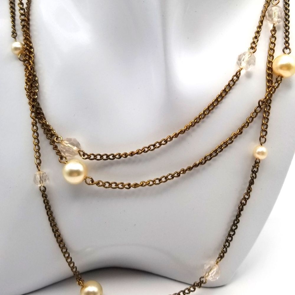 Delicate floating pearl triple strand necklace. N108
